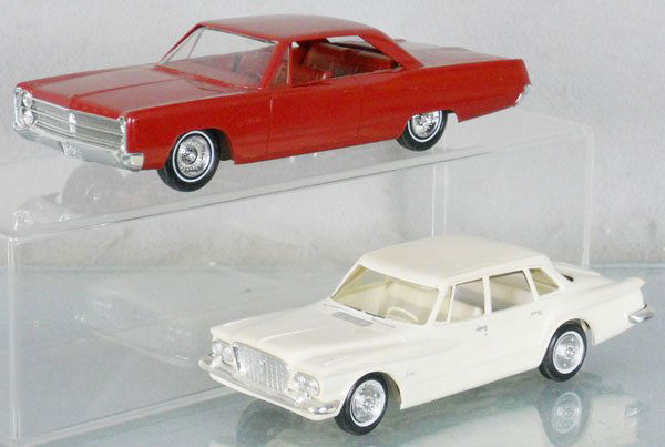 2 PLYMOUTH PROMOS: plastic, Johan 1967 Fury, red, missing hood ornament, SMP 1960 Valiant, cream, body warped, paint highlights added, C6-7.