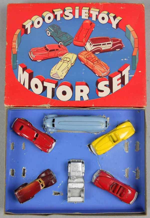TOOTSIETOY 7200 MOTOR SET: contains Buick Fastback, Greyhound Bus, Buick Y, Chrysler Windsor, Jeep, Ford Wagon, orig box & insert some wear, insert has extra holes added, box top has 3 splits, C5-7.