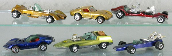 6 JOHNNY LIGHTNING VEHICLES: Triple Threat, Ferrari, Baja, Smuggler, Mako Shark, Parnelli Jones, orig issues, C5-7.