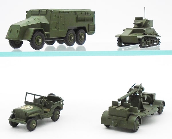 4 DINKY MILITARY VEHICLES: 677 Armoured Command Vehicle, 15A Willys Jeep, 152A Light Tank, 161B AA Gun, C7-8.