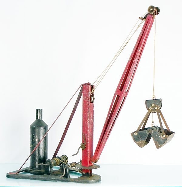KELMUT OBOY DERRICK: painted pressed steel, vertical mast is 12" tall, working, red paint alligatoring, decal minor wear, ca 1920s, C5-6.