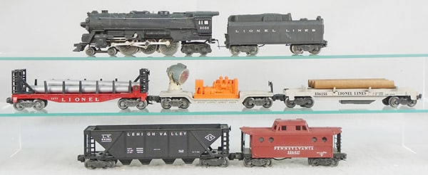 LIONEL TRAIN SET: O ga, 2055 loco w/smoke, 6024 tender, 3361 lumber car, 3620 searchlight car, 6477 miscellaneous car, 6436 hopper, 6427 caboose, orig boxes rough, loco box complete, C6-7.