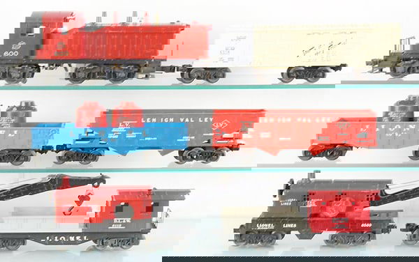 LIONEL TRAIN SET: O ga, 600 MKT switcher, screw crack, 6014 Frisco box car, 6042 gondola w/canisters, 6076 hopper, 6560 crane, working, 6119 work caboose, C7-8.