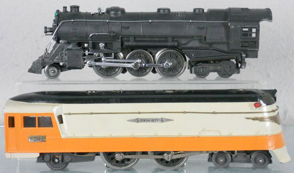 2 LIONEL LOCOS: O ga, 226E loco, missing whistle, cab roof bent, 250E Hiawatha loco, both restored, C7-8.