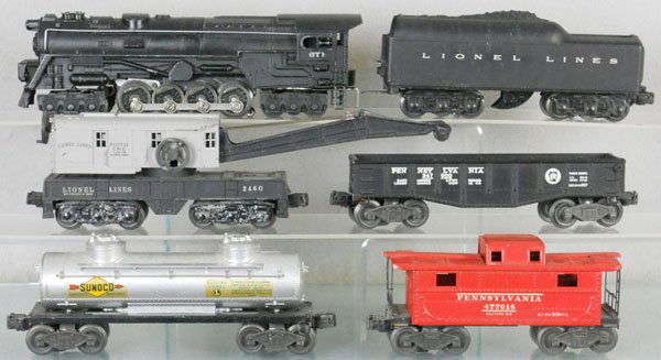 LIONEL TRAIN SET: O ga, 671 turbine loco, repainted, 2671W tender, 2 steps broken, 2460 crane, missing hook, 2452X gondola, 2465 Sunoco tank, 1 step broken, decals chipped, 2472 caboose, C5.