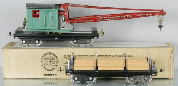2 LIONEL FREIGHT CARS: std ga, 219 crane, gears intact, 211 lumber car, 1 orig box only, C6.