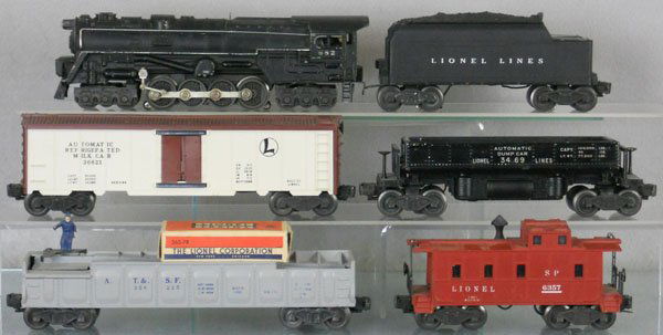 LIONEL TRAIN SET: O ga, 682 turbine loco, white stripe worn off, 6466WX tender, 3662 milk car, 3469 dump car, 3562-25 barrel car w/barrels, 6357 caboose, w/repro smokestack, roof corner repaired, C5-6.