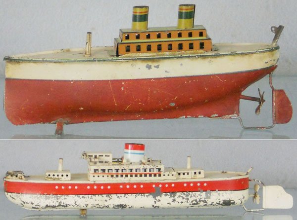 2 ARNOLD OCEANLINERS: German, handpainted tin, smaller one is windup working, missing masts & flags, 2 tabs broken on deck, 1 has flaking paint, 8 1/2" long & 11 1/2" long, C3-5.