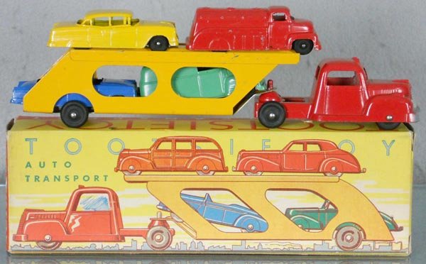 TOOTSIETOY 207 AUTO TRANSPORT: International K5 Tractor w/'55 Chevy, Ford Tanker, '55 Ford & GMC Van, orig box minor wear, C8.
