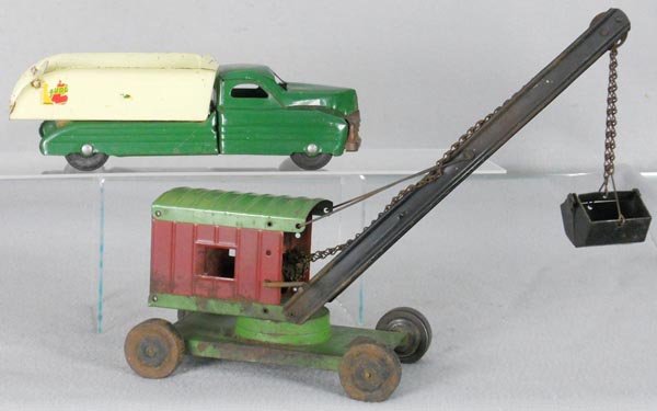 BUDDY L & STRUCTO VEHICLES: painted pressed steel, Buddy L Sand & Gravel Truck, 13" long, decals worn, trim tarnished, Structo Crane, some surface oxidation spots, 17" long, C4.