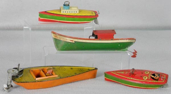 4 LINDSTROM BOATS: litho tin, windups working, Tugboat, 7 1/2" long, Emma, 10" long, some oxidation spots, Speedboat, w/outboard motor, 12" long, The Delphine 7, 7 1/2" long, C5-7.