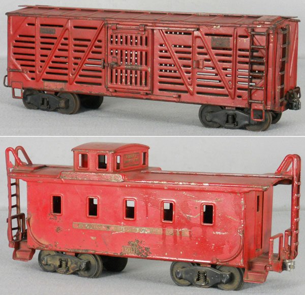 2 BUDDY L FREIGHT CARS: painted pressed steel, 1004 stock car, 21" long, 1001 caboose, 19" long, some touch up spots & decal wear, C4-5.