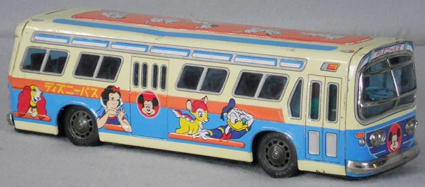 TM DISNEY BUS: litho tin, friction working, 16" long, some dents, C6.