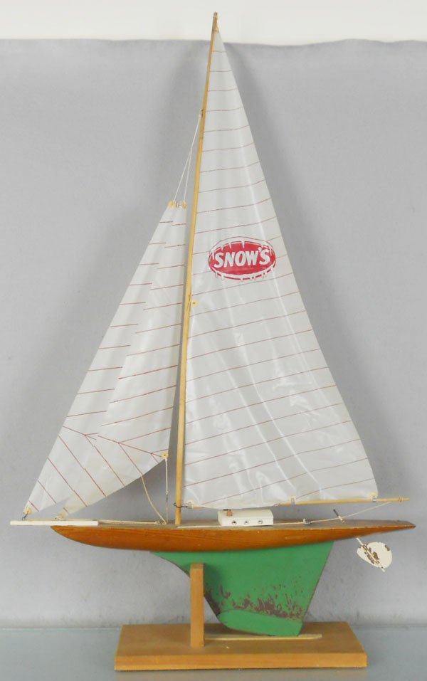KEYSTONE SAILBOAT SNOWS: ca 1955, wood w/metal keel, plastic sails, 24" long, w/stand, paint worn on keel, C5.