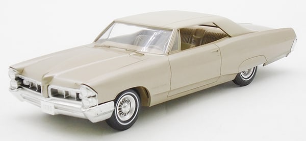 AMT 1965 PONTIAC GRAND PRIX PROMO: Capri gold, coaster, C9.