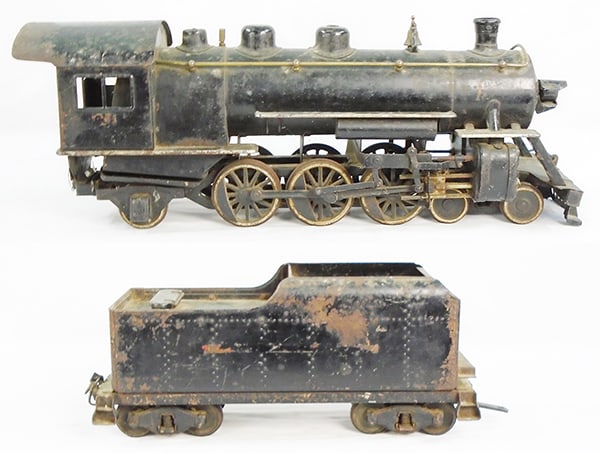 BUDDY L 1000 LOCO & TENDER: painted pressed steel, loco is 43 1/2", tender is 26", complete except for broken coupler, surface oxidation overal, decals worn, C3-4.