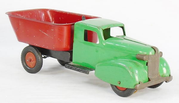 WYANDOTTE 361 DUMP TRUCK: painted pressed steel, 16" long, green & red, rubber tires on wood hubs, grille tarnished, ca 1937, C6.