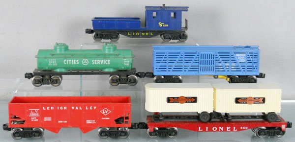 5 LIONEL FREIGHT CARS: O ga, 6476 hopper, 6430 flat w/trailers, 6045 Cities Service tank, 3376 Bronx Zoo car, 6219 C&O work caboose, C5-7.