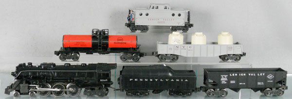 LIONEL TRAIN SET: O ga, 2046 loco, 2671W tender, 6456 hopper, 6315 Gulf tank, 6562 gondola w/cannisters, 6417 caboose, C5-7.