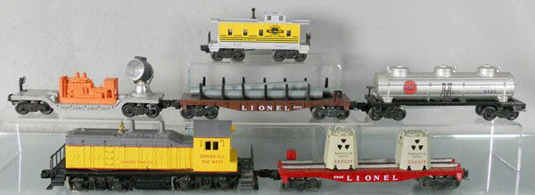 LIONEL TRAIN SET: O ga, 613 UP diesel switcher, front screw cracked, 6805 radioactive car, 3620 searchlight, 6511 pipe car, 6425 Gulf tank, 6057 Rio Grande caboose, minor decal chips, C5-7.