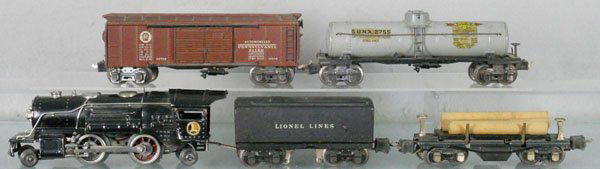 LIONEL TRAIN SET: O ga, 259E loco, 2689W tender, 3651 log dump, 2758 box car, 1 door cracked, 2755 Sunoco tank, some oxidation spots, decals yellowed, C4-5.
