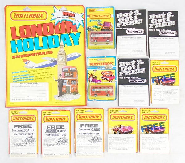 MATCHBOX LONDON HOLIDAY SWEEPSTAKES: easel-backed display, 14" x 11", ca 1982, w/entry blanks, 2 #17 Buses on blister cards, w/9 entry blanks to contests, C7-8.