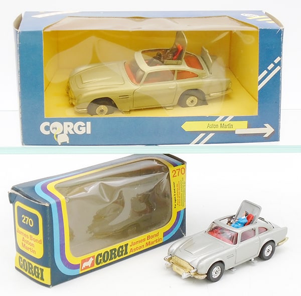2 CORGI JAMES BOND ASTON MARTINS: C271/1, silver in blue, orig box, 270, silver, orig box missing insert, both are complete & working, orig boxes minor wear, C9.
