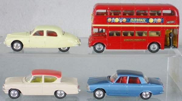 4 CORGI VEHICLES: 208 Jaguar, 468 Outspan Bus, 234 Ford Consul, 252 Rover 2000, C7-9.