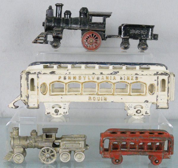 CAST IRON TRAIN LOT: painted cast iron, Dent loco & tender, 9" long, Hubley coach, 9 1/2" long, Hubley loco, 5" long, Dent coach, 4" long, C4-5.