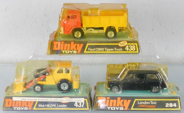 3 DINKY VEHICLES: 437 Muir Hill Loader, 284 London Taxi, 438 Ford D800 Tipper Truck, orig boxes, tops yellowed, some wear, 1 rough, C8-9.