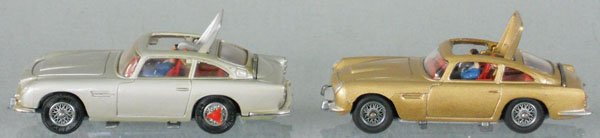 2 CORGI JAMES BOND ASTON MARTIN'S: 261, rear shield stuck, 270, passenger ejector not working, C6-7.