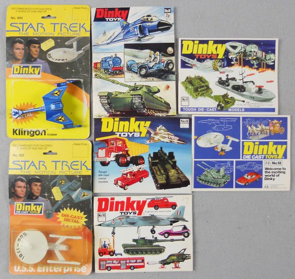 DINKY LOT: Catalogs #'s 8, 9, 10, 11 & 12, all crisp & clean, w/Star Trek 804 Klingon Cruiser, sealed on orig card, card has minor wear, 805 USS Enterprise, loose, w/incom orig card, C8-10.