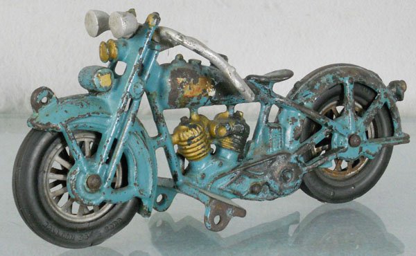 HUBLEY HARLEY DAVIDSON MOTORCYCLE: painted cast iron, 8 1/2" long, missing figures, paint & decal worn, handlebars bent, missing outboard wheels, C4.