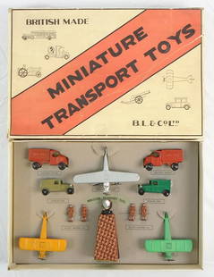 JOHILLCO AIR MAIL SET: this set is an English copy of the Tootsietoy set, 2 Mack Mail Vans, red, 2 Model A Vans, green, 2 Aero Dawn Airplanes, all marked "Made in England", litho paper Pylon w/die cast top, 4 Pilots, the Tr