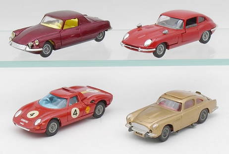 4 CORGI VEHICLES: 259 Citroen Le Dandy, 335 Jaguar E-Type, 314 Ferrari 250 LM, decals added, 261 James Bond Aston Martin, all features work, C8-9.