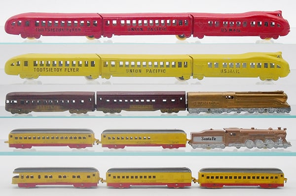 4 TOOTSIETOY TRAIN SETS (1 of 2)
