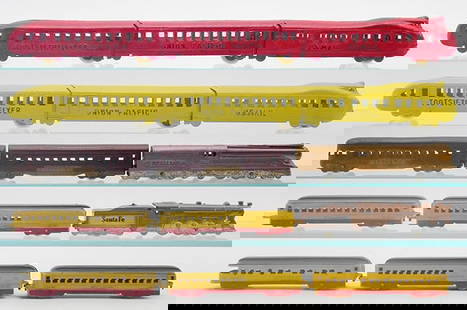 4 TOOTSIETOY TRAIN SETS: 196 Flyer Set, red, touch up, 196 Flyer Set, yellow, the front & rear car have professionally restored lettering, 188 Broadway Limited obsv has a broken coupler, Santa Fe set w/5 yellow, red & silver