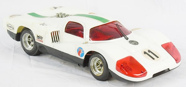 ELGI-REEL 1967 MATRA RACER: plastic, 16 1/2", radio controlled, not tested, w/controller, some oxidation on antenna & in battery box, orig styrofoam clamshell, C6-7.