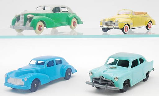 4 TOY VEHICLES: Hubley LaSalle, 7", touched up, Wood Oldsmobile, 5 3/4", Hubley Cadillac, 7", restored, Banthrico Henry J, 7 1/4", no-motor version, C8.