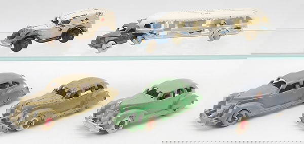 5 ARCADE & HUBLEY VEHICLES: painted cast iron, Arcade Chevrolet Ambulance, 4", Greyhound Lines, 7 1/4", 3 Hubley Lincoln Zephyrs, 2 are 5", 1 is 6", the gray one is restored, C5-9.