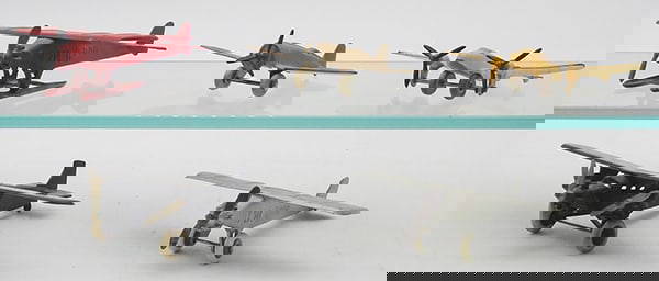 5 TOOTSIETOY AIRPLANES: 4675 Sea Plane, red, 119 Army Plane, copper, 125 Lockheed Electra, yellow, wing warped, 4649 Trimotor, black, 4660 Aerodawn, silver, C6-8.