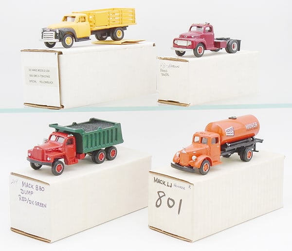 4 DEHANES TRUCKS: resin, 1/43 scale, 1950 GMC 2-ton Stake Truck, 1948 Ford Tractor, 204 Mack B80 Dump Truck, 201 Mack LJ Hooker Chemical Tanker, w/all trim, orig boxes, C9. Box 7" x 4" x 4"