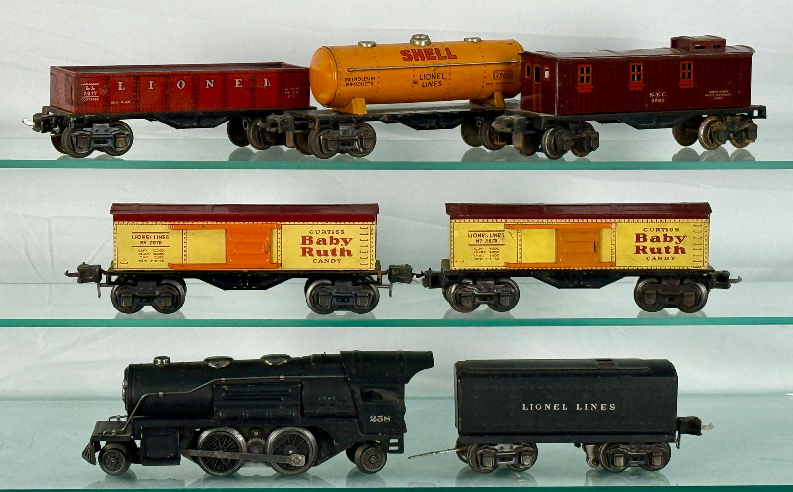 Lionel Prewar O Freight Trains: Lionel 258 locomotive, 2689W tender, Litho Freight Cars 2 # 2679, 2680, 2677, 2682, C6-7.