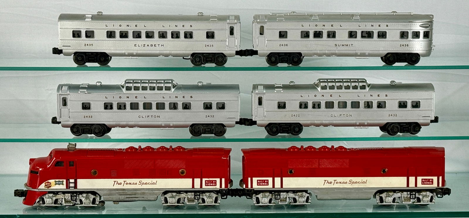 A Lionel Postwar 'The Texas Special' O27 Passenger Train Set, No. 1520W, Circa 1954: A Lionel Postwar 'The Texas Special' O27 Passenger Train Set, No. 1520W, Circa 1954. The set features a two-unit red 'The Texas Special' diesel locomotive, model 2245P M-K-T, equipped with Magne-Tract