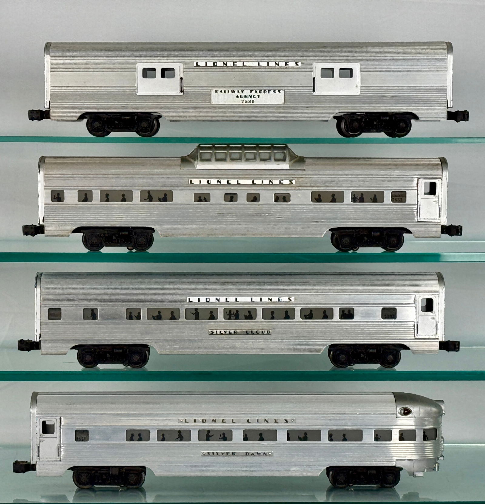 A Collection of Four Lionel Postwar O Gauge Aluminum Passenger Cars (1 of 3)
