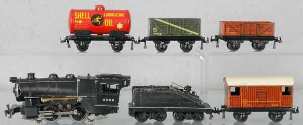 TRIX TRAIN SET: HO ga, 3-rail, 525 loco, warped & cracked, tender, missing coupler, 4 freight cars, track, orig set box worn, C6-8.