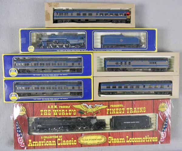 RIVAROSSI & AHM TRAIN LOT: HO ga, 2-rail, NMRA 1980 Special set, 5087-50 heavy loco w/5 coaches, AHM 5111 cab forward, factory sealed in orig box, orig boxes & inserts minor wear, C8-10.