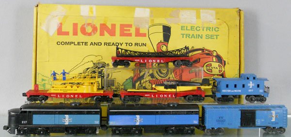 LIONEL 1615 TRAIN SET: O ga, 217 diesel A, coupler support broken, cab cracked, 217 B unit, scraped, 6464-475 box car, 6825 flat w/girder bridge, 6800 flat w/airplane, missing 1 wing, 6812 inspection car, 6017 caboose, orig