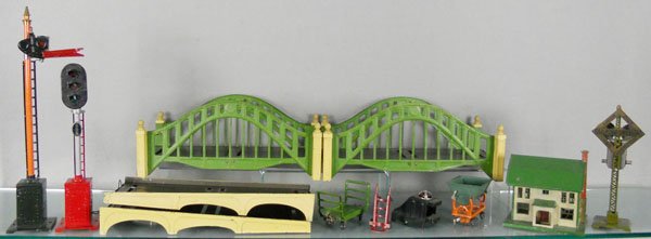 9 LIONEL ACCESSORIES: std ga, 82 semaphore, restored, 99N block signal, 102 double span bridge, 161 baggage cart, 157 hand truck, 025 bumper, 162 dump truck, 189 house, repainted, 69 ringing signal, C5-6.