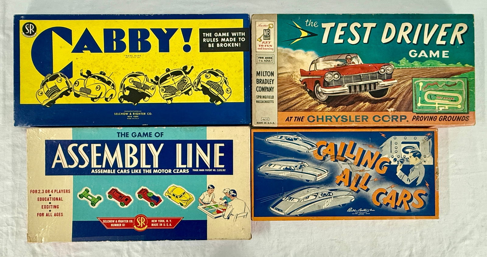 A Group of Four Vintage Automotive Board Games: A group of four vintage board games including 'Cabby!' by Selchow & Righter, 'the TEST DRIVER GAME' from 1956 by Milton Bradley, 'THE GAME OF ASSEMBLY LINE' by Selchow & Righter, and 'CALLING